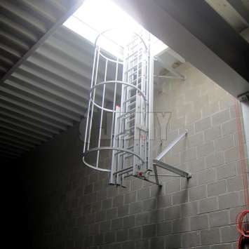 Drop-down ladder - Mounted at distance from the facade Drop-down ladder mounted at distance from the facade.